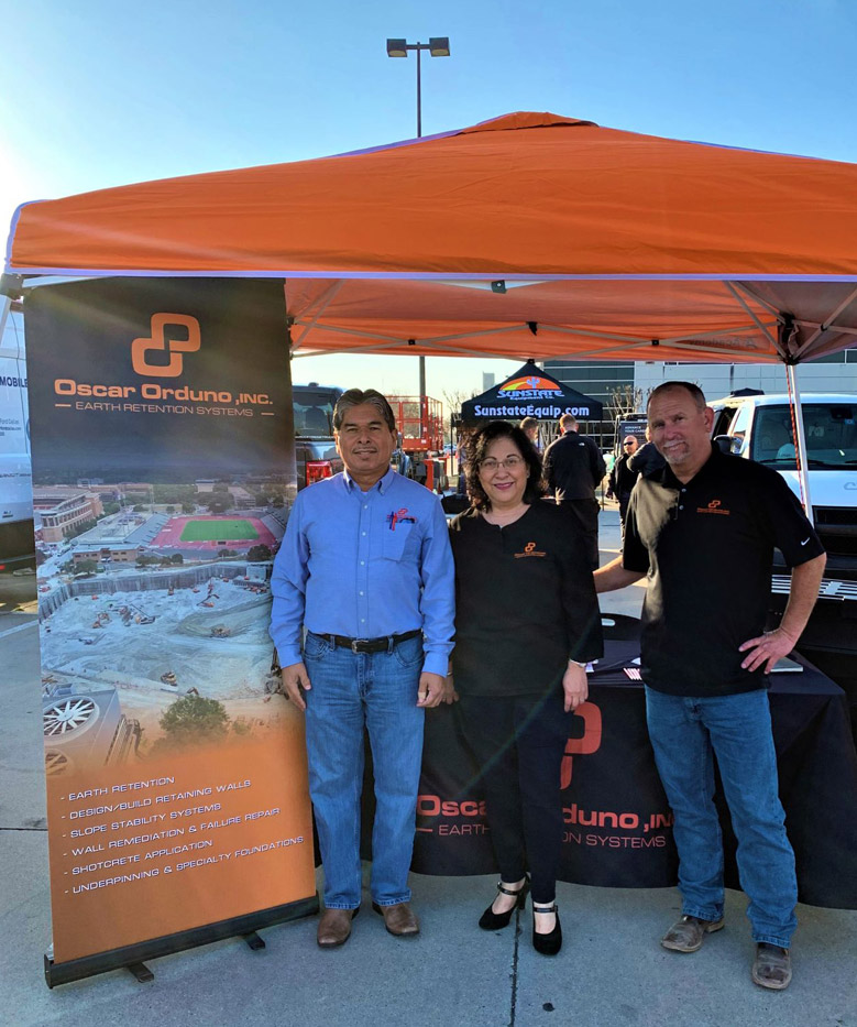 Oscar Orduno, Inc. team at a professional event showcasing specialized earth retention systems and geotechnical engineering services.