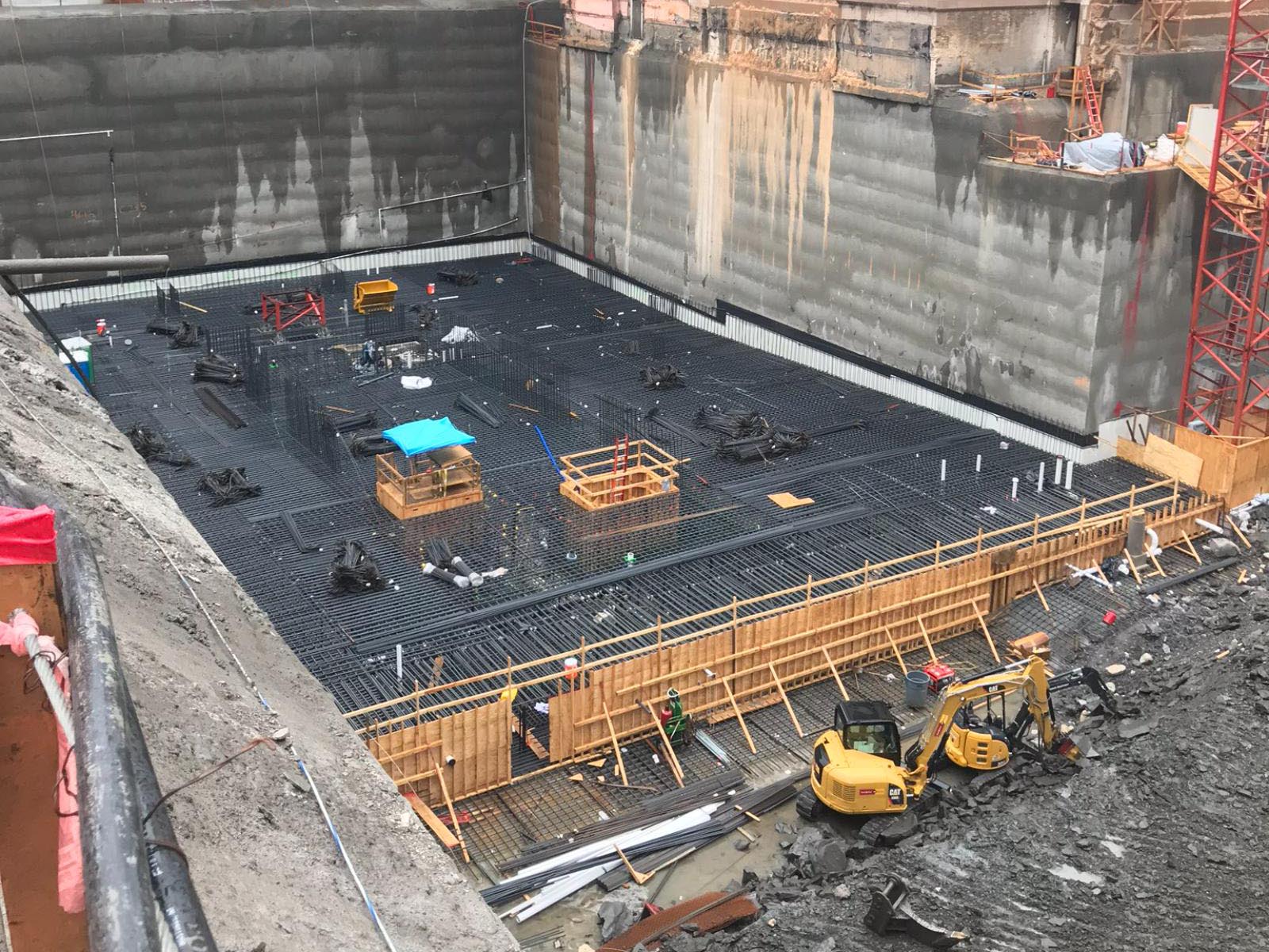 Oscar Orduno, Inc. specialized drilling equipment and field personnel performing horizontal anchor installation for an urban earth retention system for Indeed Tower in Austin, Texas