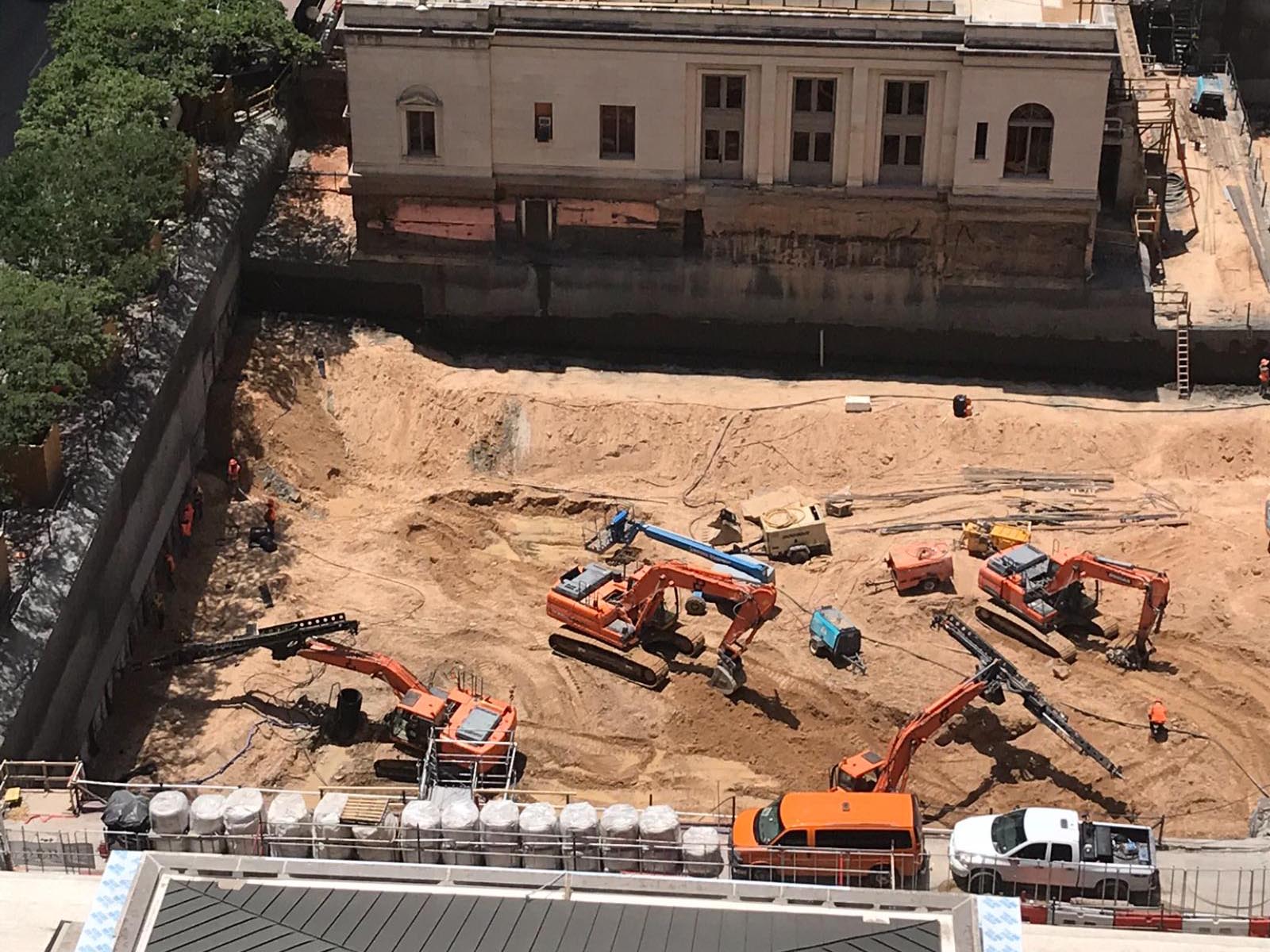 Oscar Orduno, Inc. field crew installing heavy-duty steel reinforcement mesh for a foundation stabilization project.Oscar Orduno, Inc. field crew installing heavy-duty steel reinforcement mesh for a foundation stabilization project for Indeed Tower in Austin, Texas.
