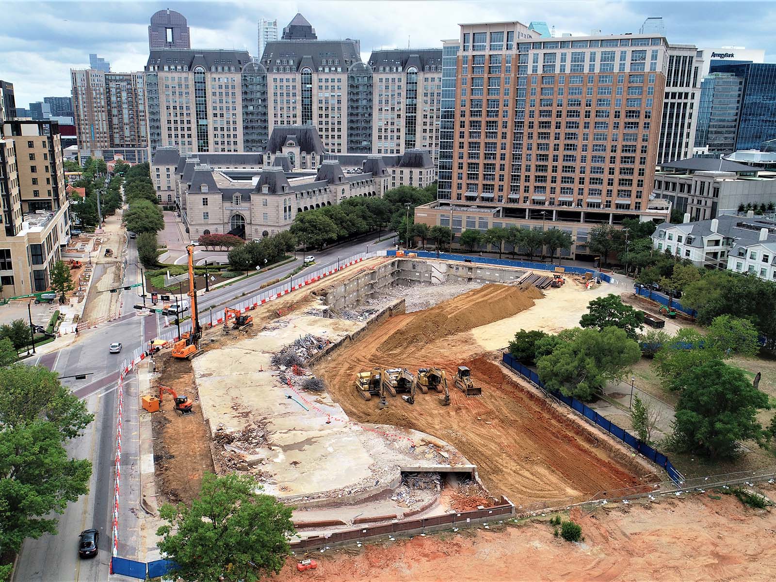 Aerial view of a deep pit stabilization using Anchored Soldier Piles and Rock Nails by Oscar Orduno, Inc.