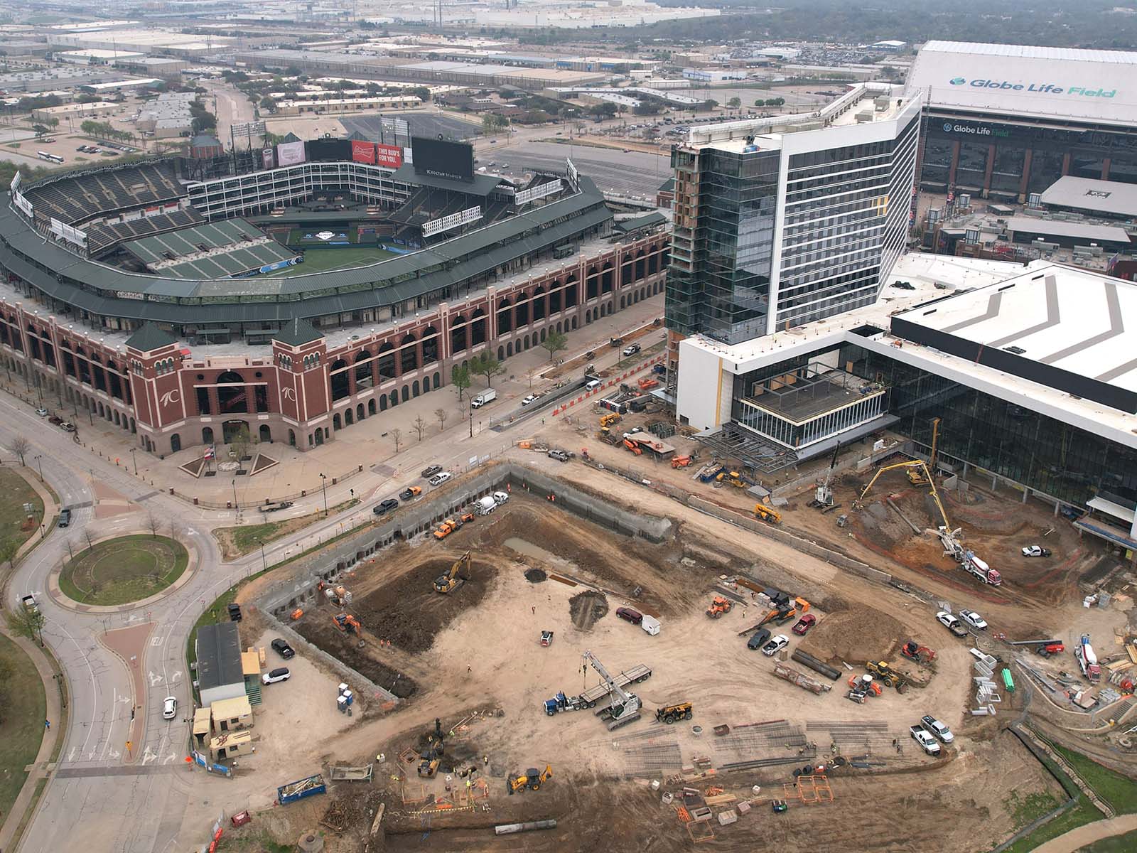 Aerial view of One Rangers Way in Arlington, TX, featuring Anchored Soldier Piles and Soil Nail Anchors by Oscar Orduno, Inc. near Choctaw Stadium.