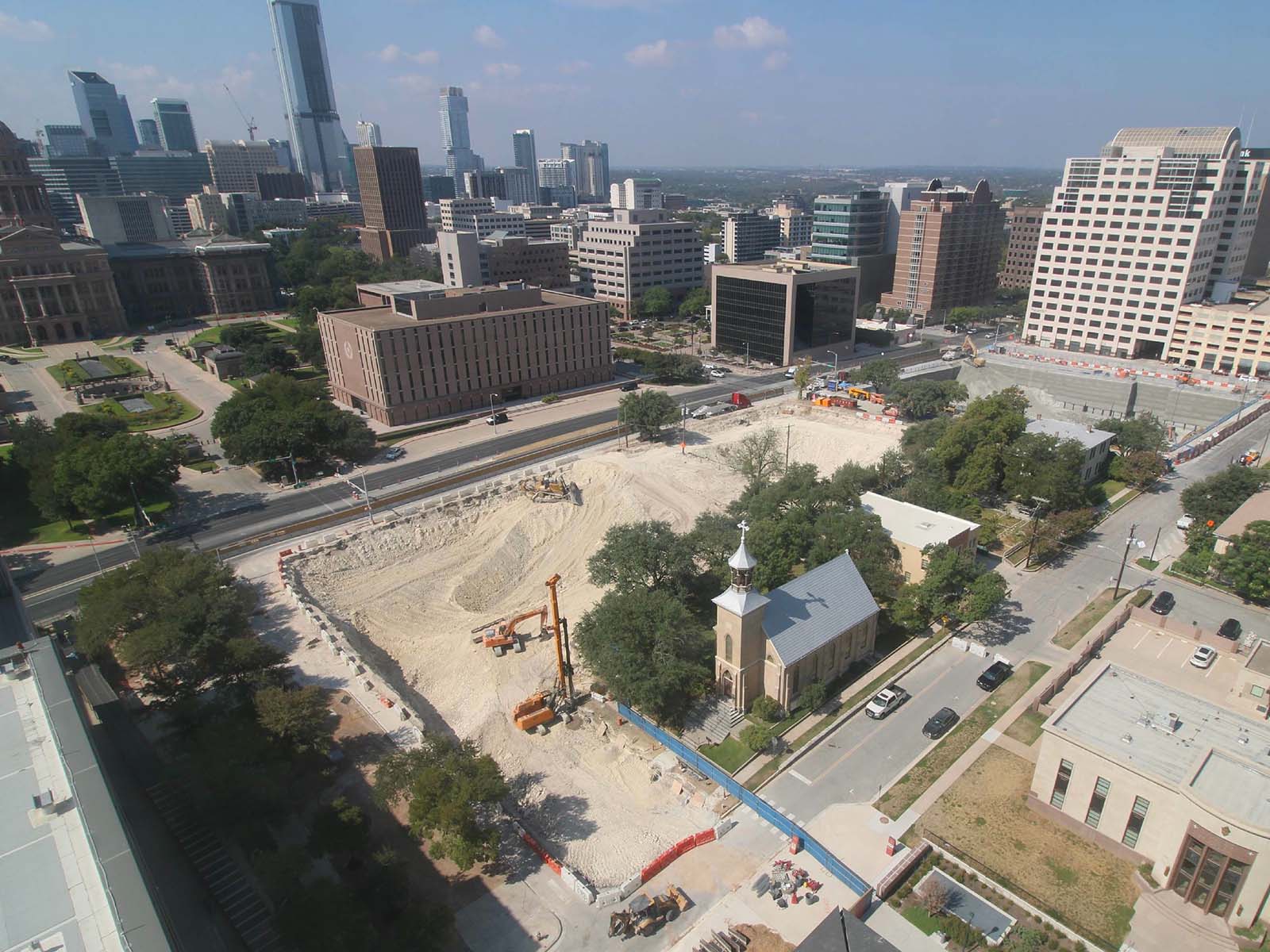 Aerial view of a multi-tiered soil nail and rock anchor earth retention system installed by Oscar Orduno, Inc. for Capitol Complex Phase I in Austin, Texas.