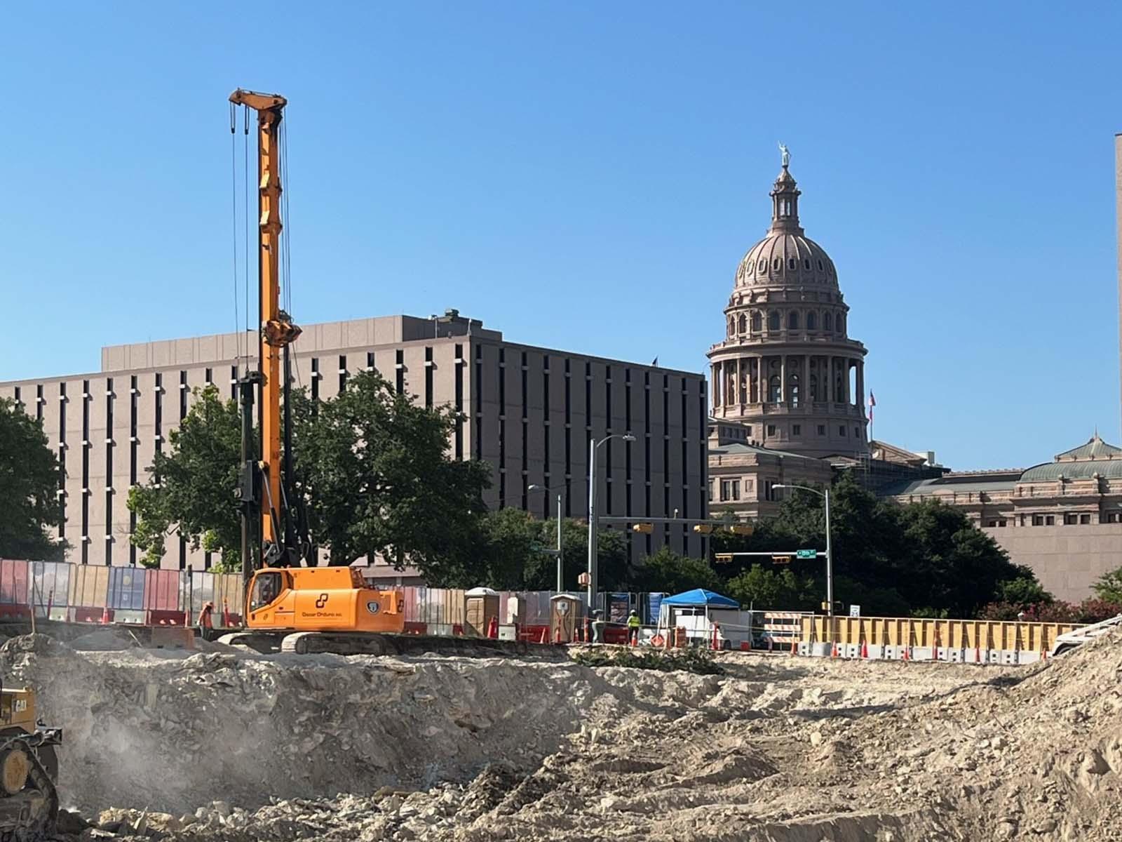 Oscar Orduno, Inc. utilizing specialized drilling rigs for an Anchored Soldier Pile system at Capitol Complex Phase II in Austin, Texas.