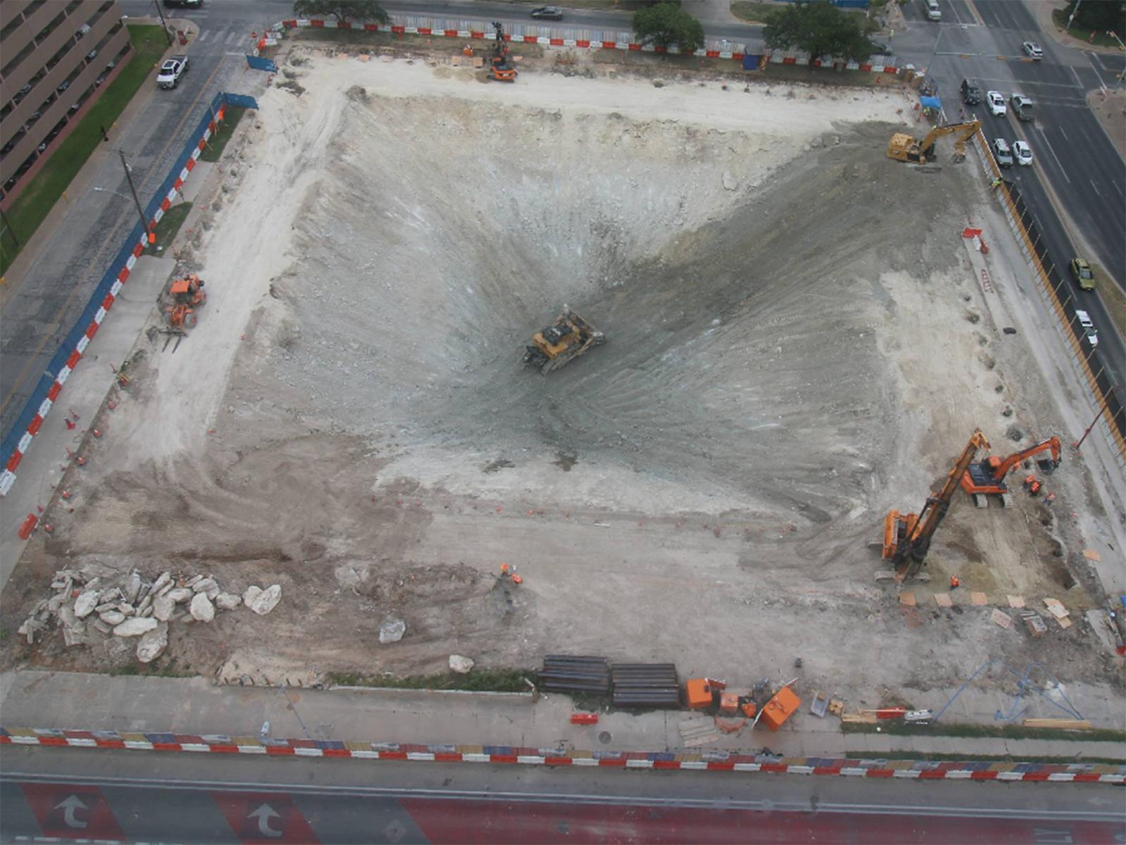 Aerial view of mass excavation and earth retention at Texas Capitol Complex Phase II in Austin, TX, by Oscar Orduno, Inc.