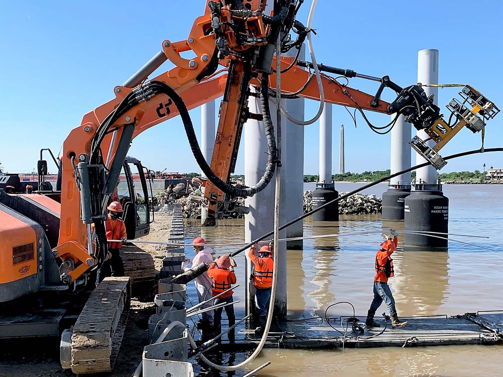 Field crew installing Tieback Anchors for marine geotechnical reinforcement at the Lynchburg Ferry Post in Houston, TX.