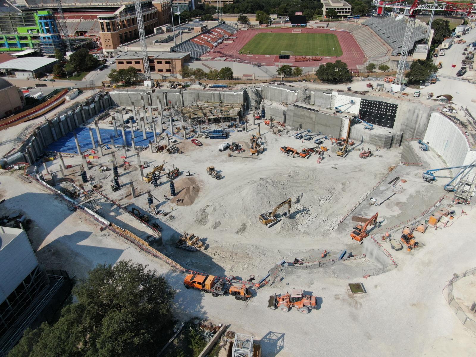 Hybrid shoring system utilizing Anchored Soldier Pile Wall and Permanent Soil Nails for the UT Moody Center in Austin, TX.