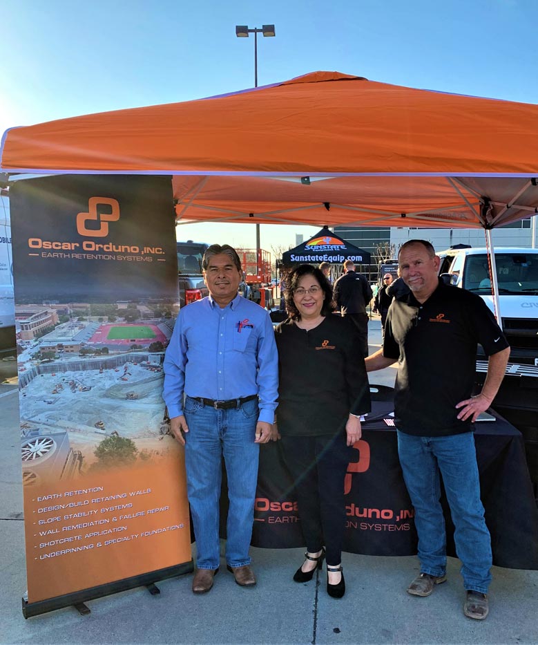 Oscar Orduno, Inc. professional team at an industry event showcasing their design-build earth retention and specialty foundation services.